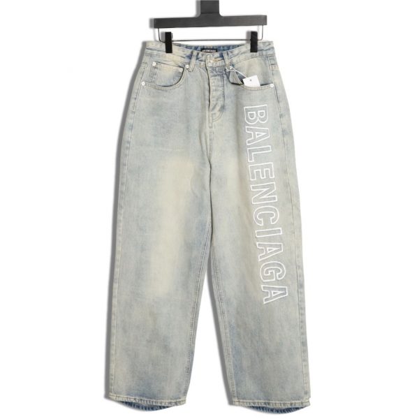 Balenciaga's Washed Wide Leg Baggy Jeans with Embroidered Lettering